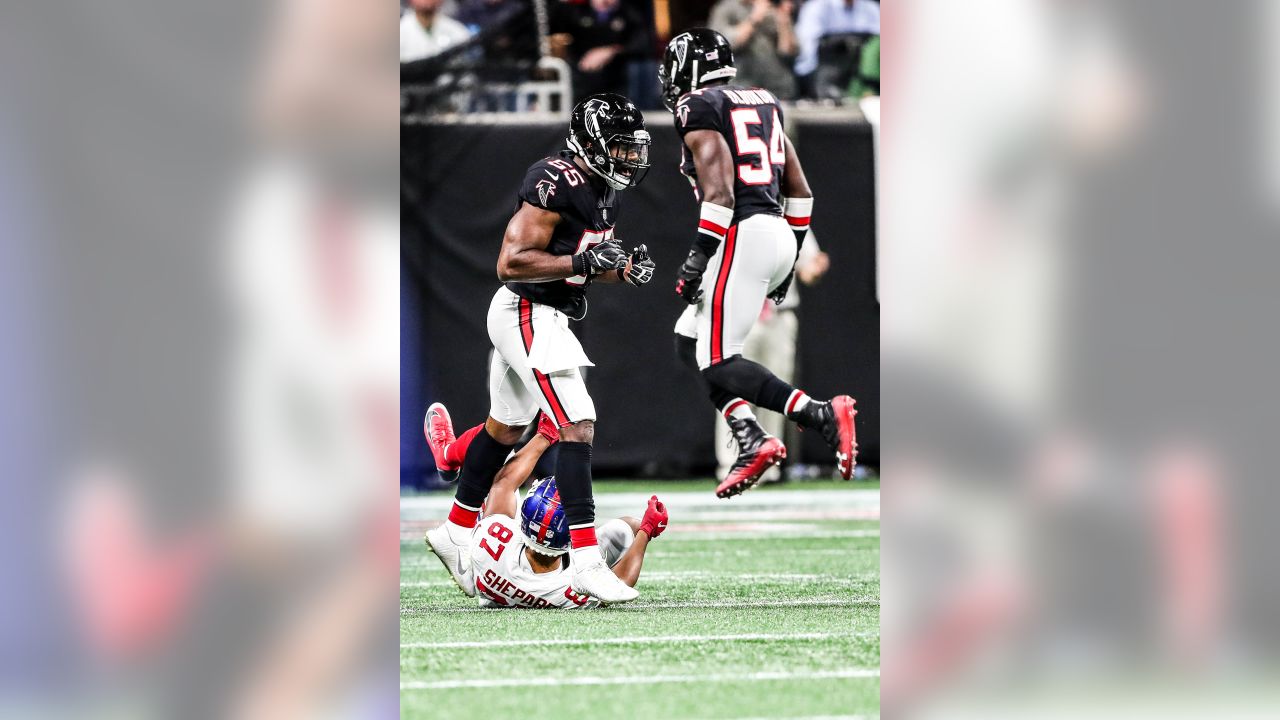 Atlanta Falcons linebacker Foye Oluokun (54) reaches ts after a Atlanta  Falcons recovery on a kickoff against the New Orleans Saints during the  second half of an NFL football game, Thursday, Nov.