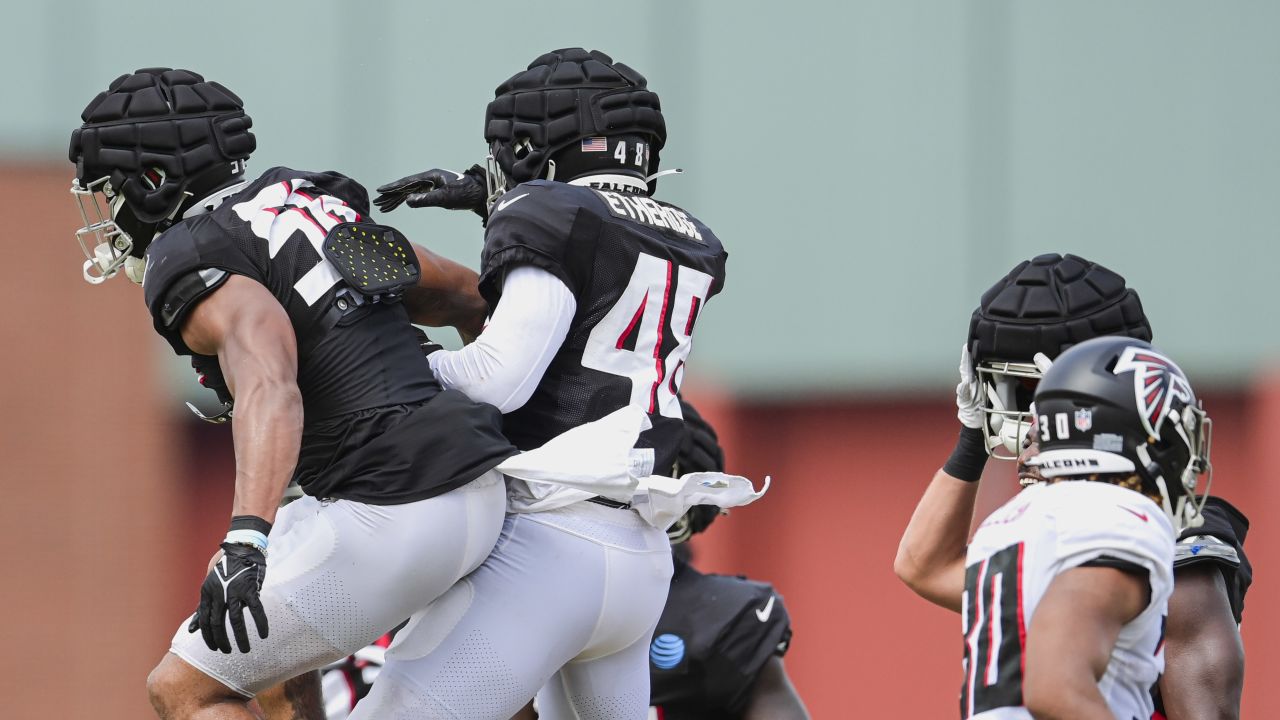 Atlanta Falcons linebacker Quinton Bell (56) works during the