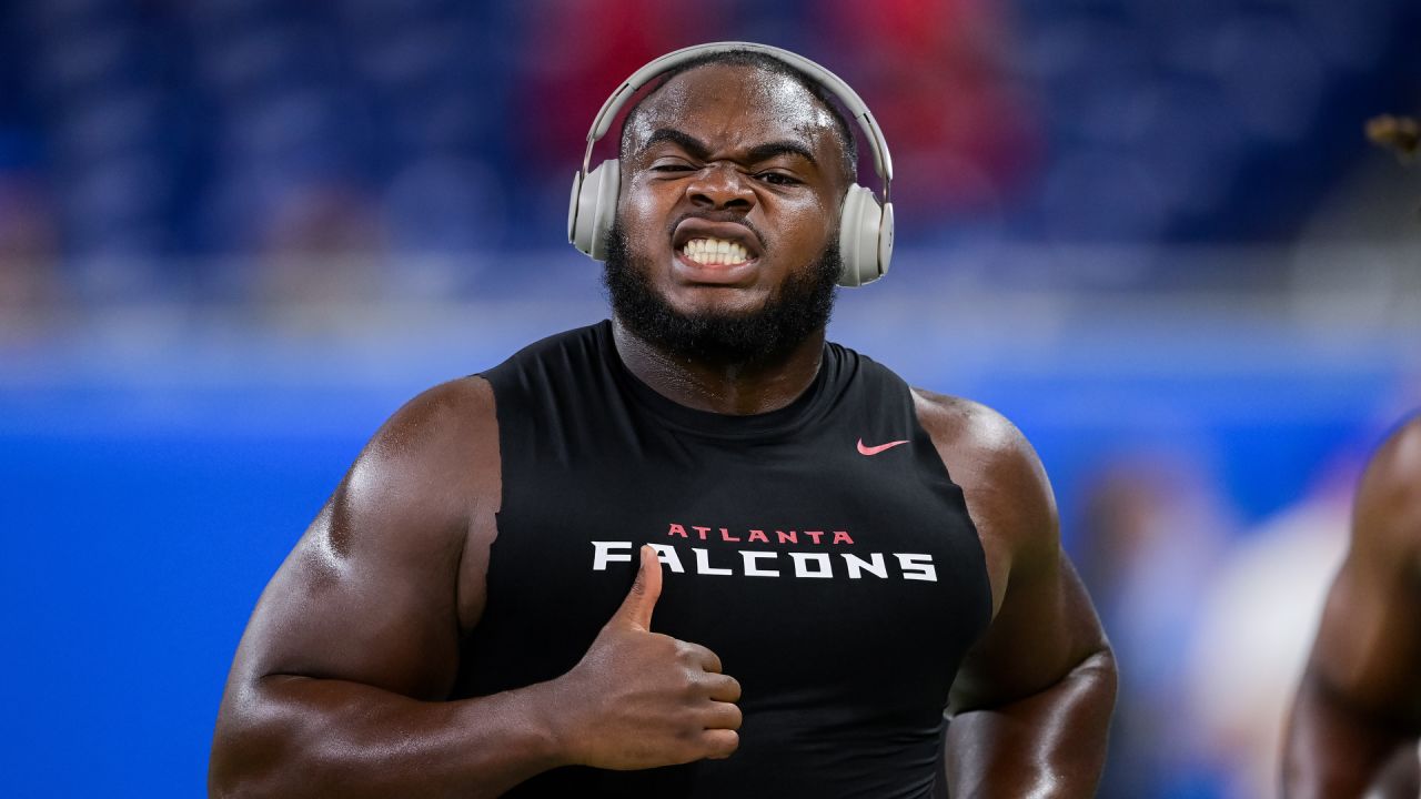 Arthur Jones #97 of the Baltimore Ravens reacts as he walks back ot the  locker room