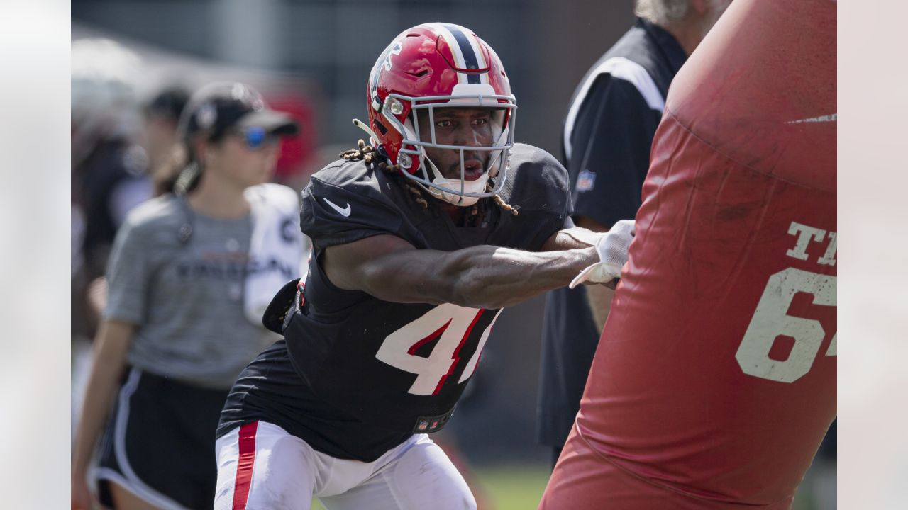 Detroit Lions running back Godwin Igwebuike (35) runs a route against  Atlanta Falcons' Rashad Smith (59) during the second half of a preseason  NFL football game, Friday, Aug. 12, 2022, in Detroit. (