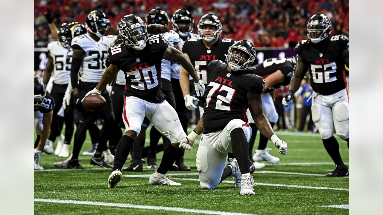 Atlanta Falcons players celebrate a touchdown by Atlanta Falcons