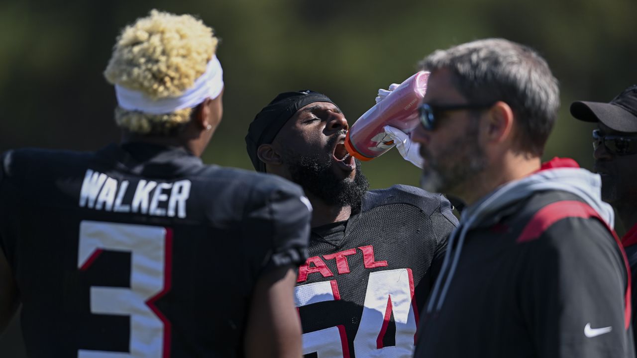 Cincinnati Bengals hat next to a Gatorade bottle during an NFL