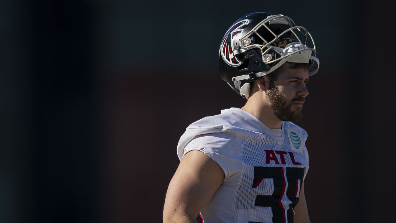 Atlanta Falcons running back Clint Ratkovich runs with the football News  Photo - Getty Images