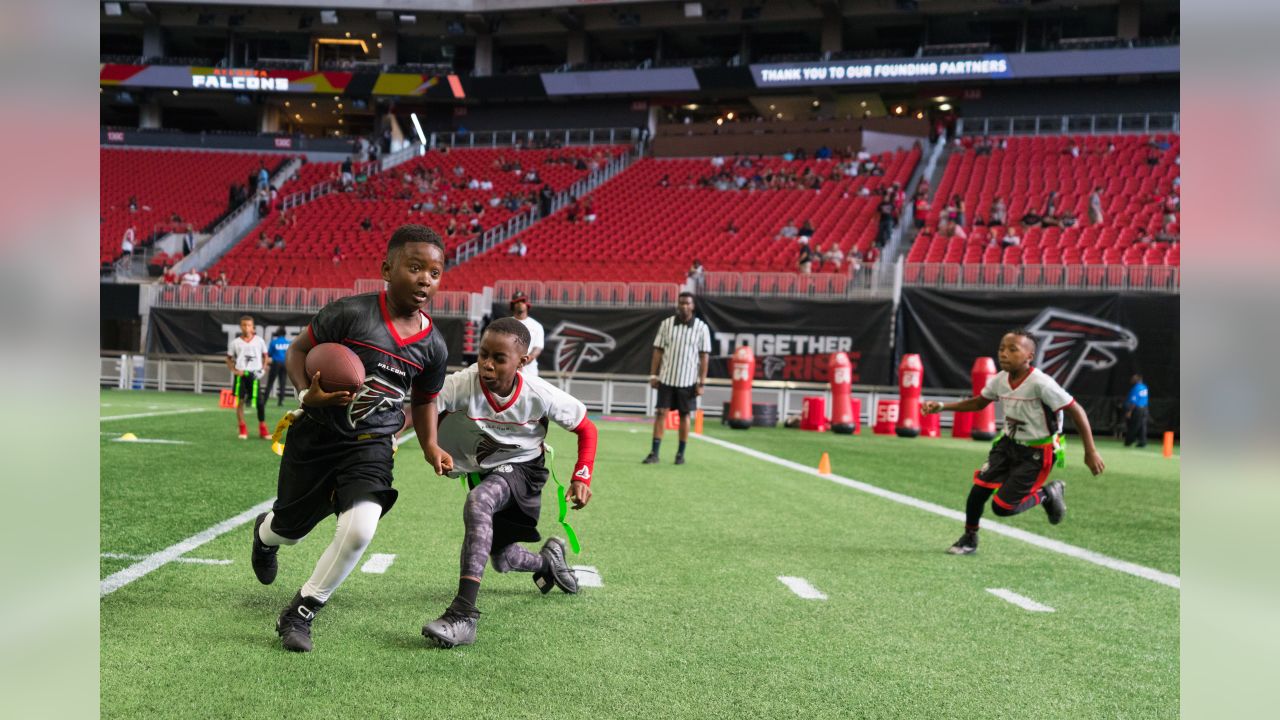 PHOTOS: NFL FLAG football teams take the field at Mercedes-Benz Stadium