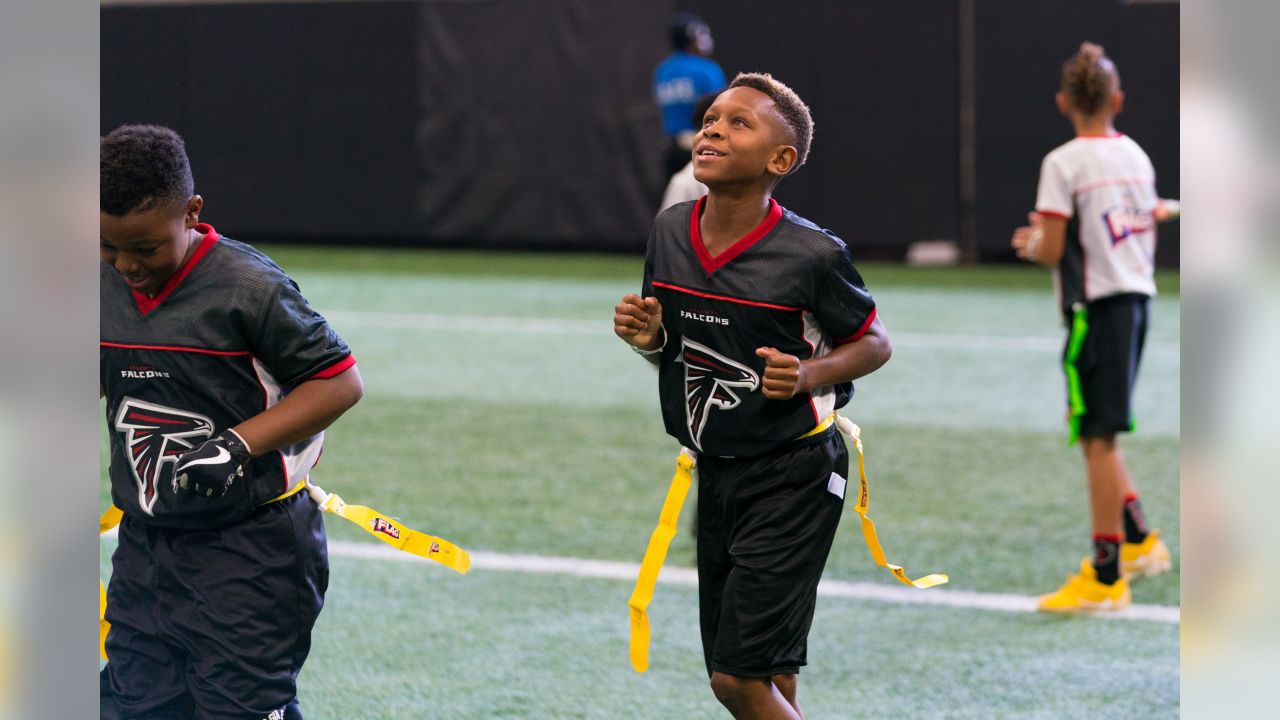 PHOTOS: NFL FLAG football teams take the field at Mercedes-Benz Stadium