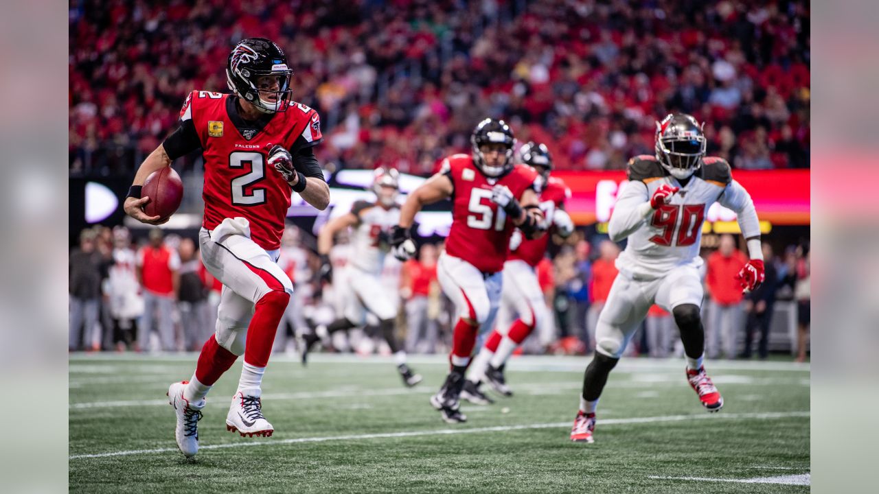 Tampa Bay Buccaneers vs. Atlanta Falcons. Fans support on NFL Game.  Silhouette of supporters, big screen with two rivals in background Stock  Photo - Alamy