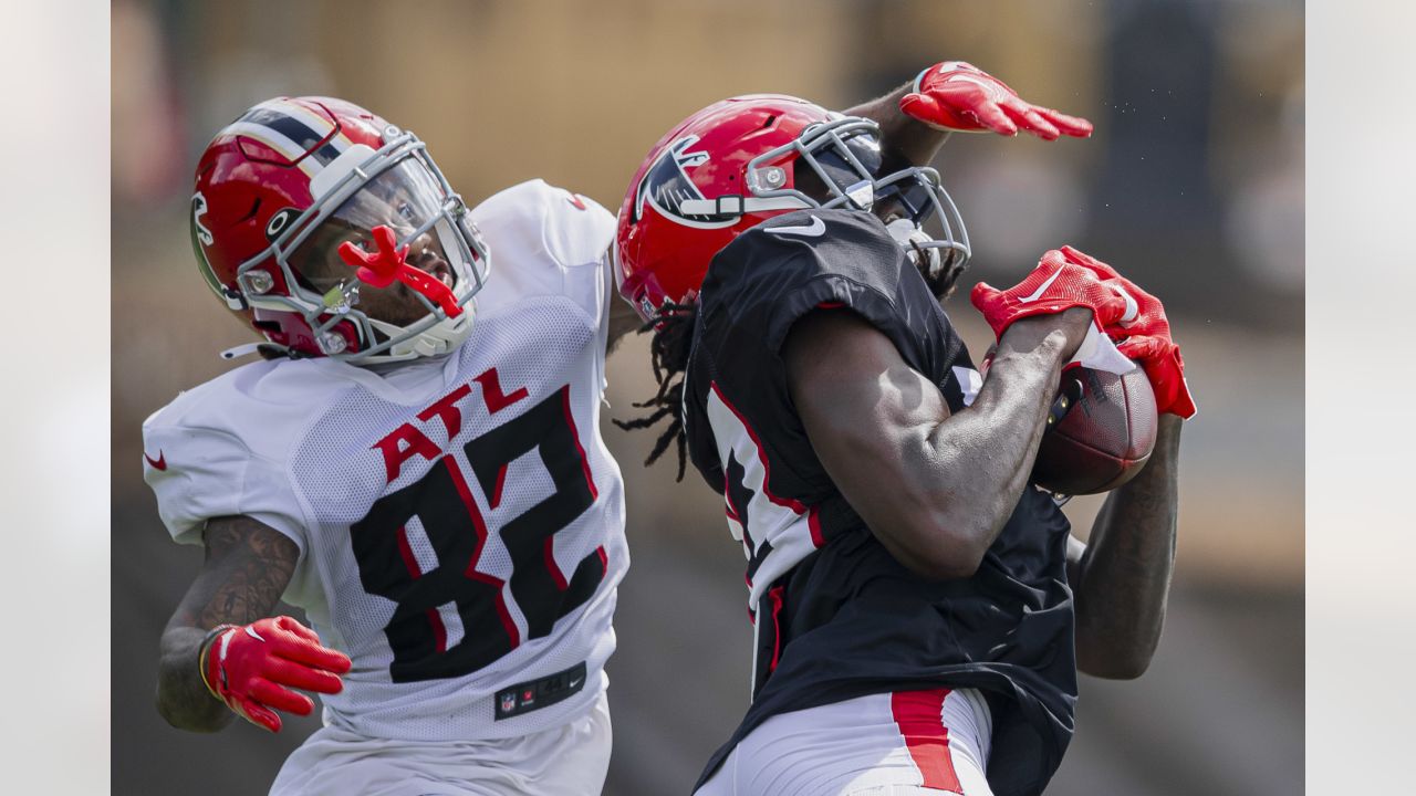 Detroit Lions running back Godwin Igwebuike (35) runs a route against  Atlanta Falcons' Rashad Smith (59) during the second half of a preseason  NFL football game, Friday, Aug. 12, 2022, in Detroit. (