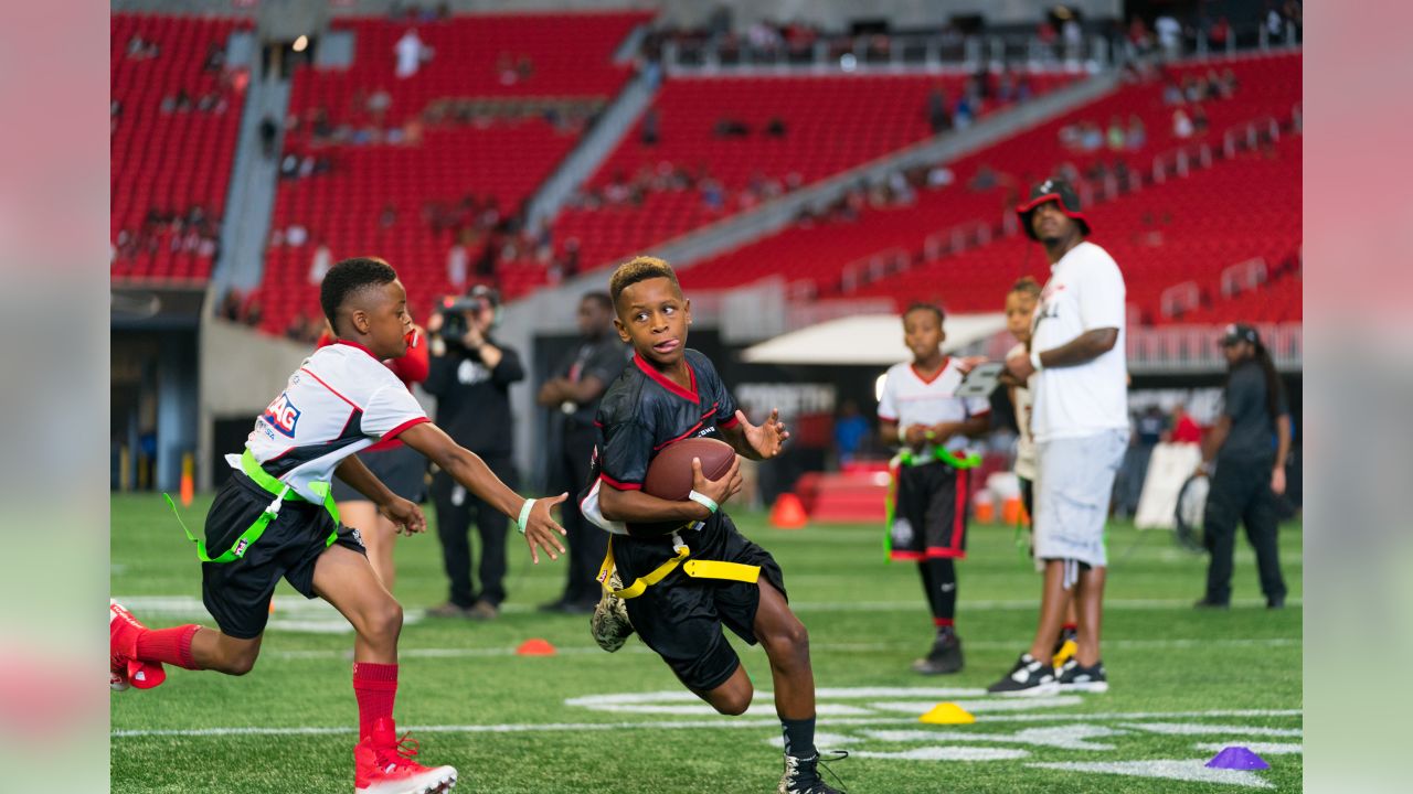 PHOTOS: NFL FLAG football teams take the field at Mercedes-Benz Stadium