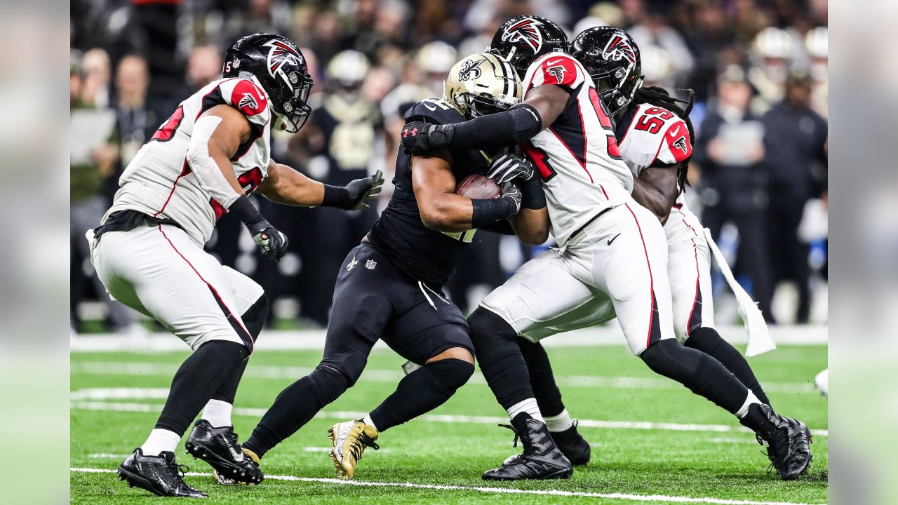 Atlanta Falcons linebacker Foye Oluokun (54) reaches ts after a Atlanta  Falcons recovery on a kickoff against the New Orleans Saints during the  second half of an NFL football game, Thursday, Nov.