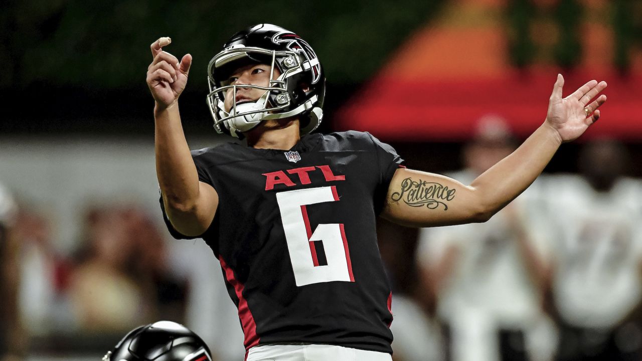 Atlanta Falcons place kicker Younghoe Koo (7) celebrates with Atlanta  Falcons long snapper Liam McCullough (48) after Koo's field goal against  the Chicago Bears during the second half of an NFL football