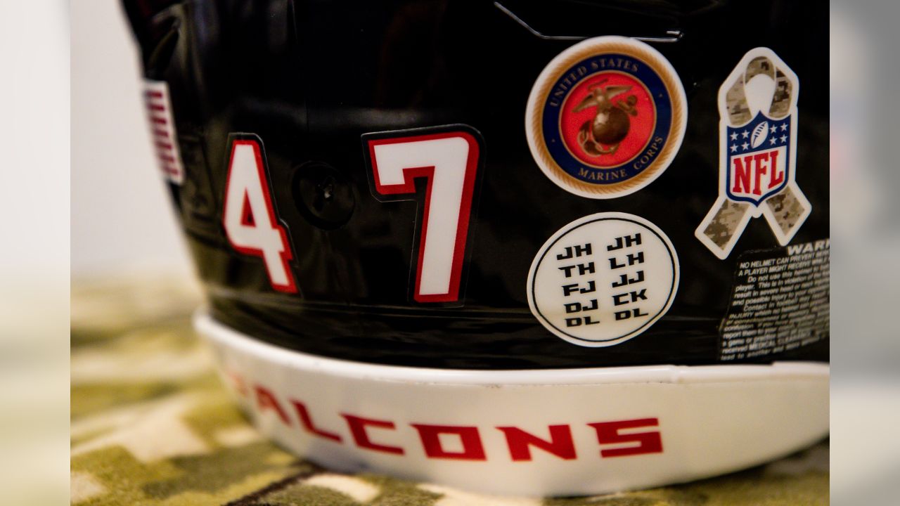 A Salute to Service ribbon is seen on the back of the helmet of