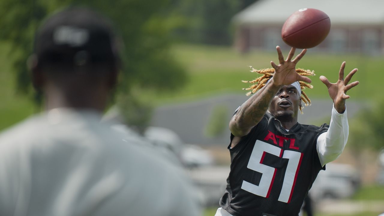 Atlanta Falcons linebacker DeAngelo Malone (51) works during the