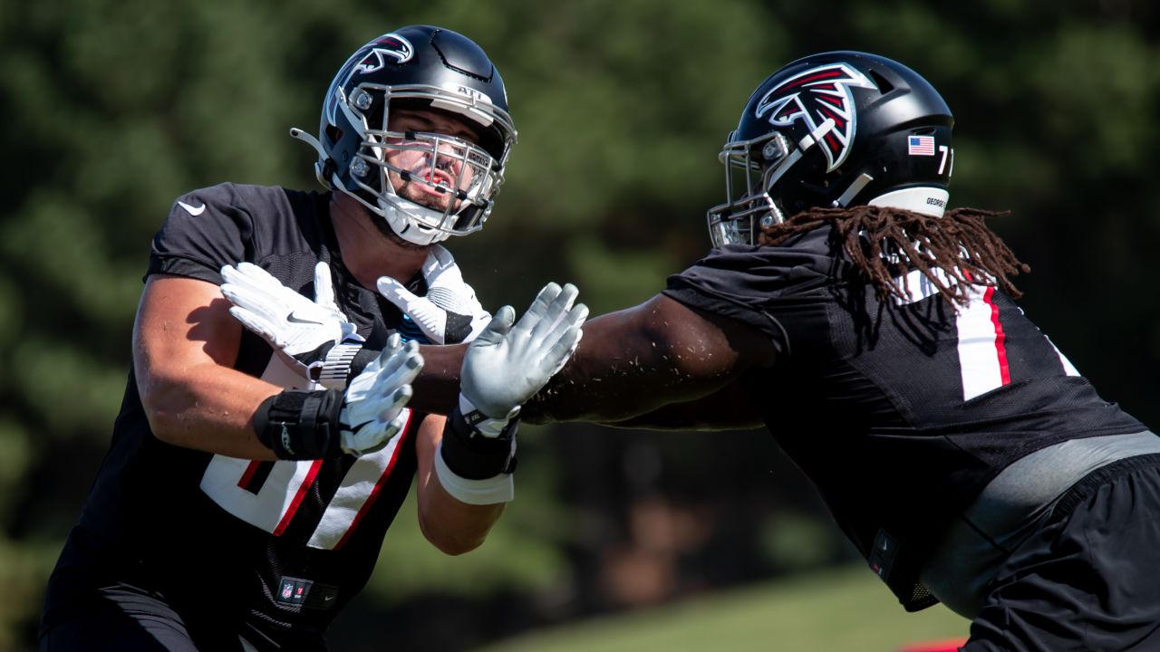 Atlanta Falcons offensive guard James Carpenter (77) takes the