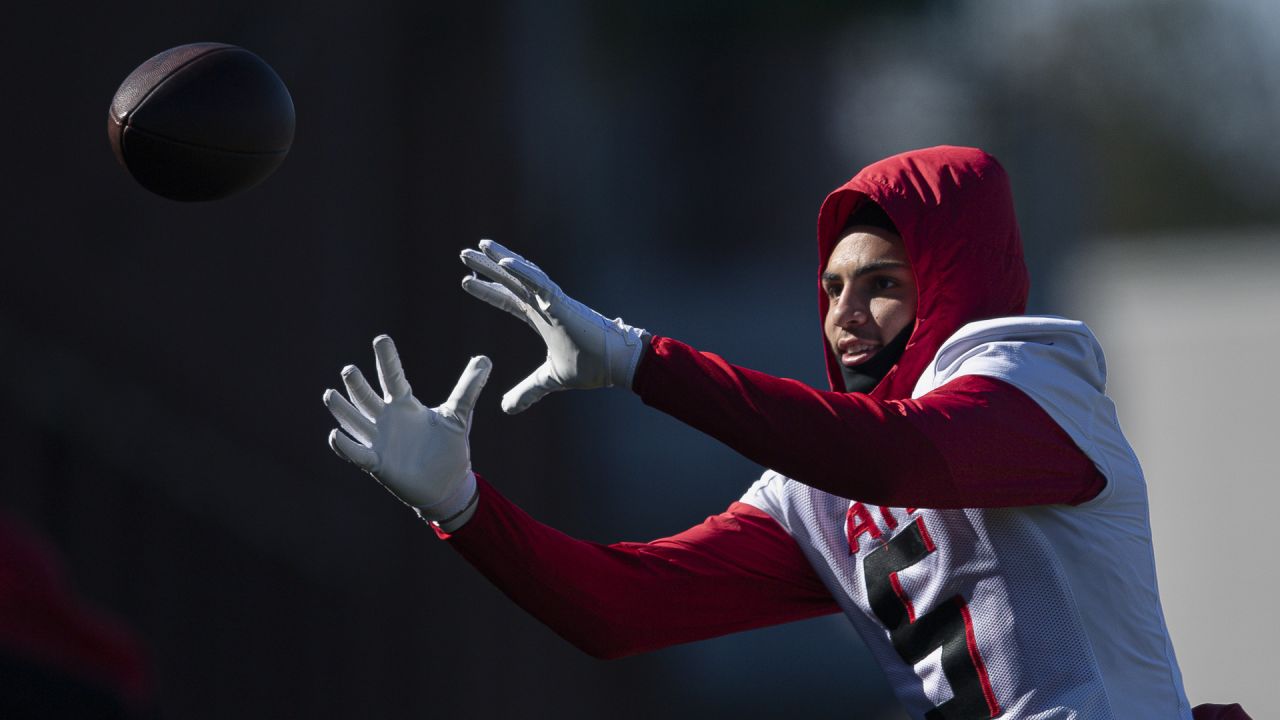 Carolina Panthers defensive tackle Derrick Brown (95) hits Atlanta Falcons  running back Tyler Allgeier (25) during