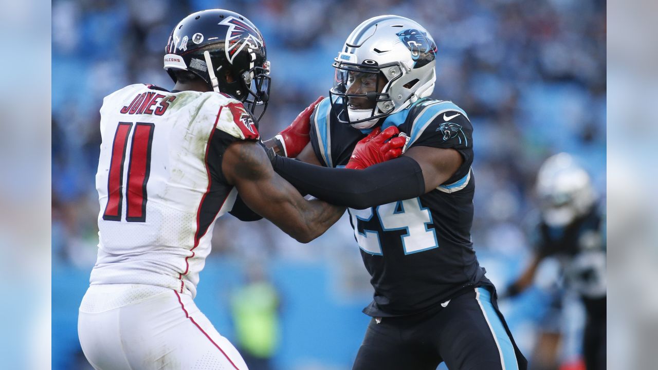 Atlanta Falcons' Julio Jones (11) is tackled by Carolina Panthers' Luke  Kuechly (59) during the first