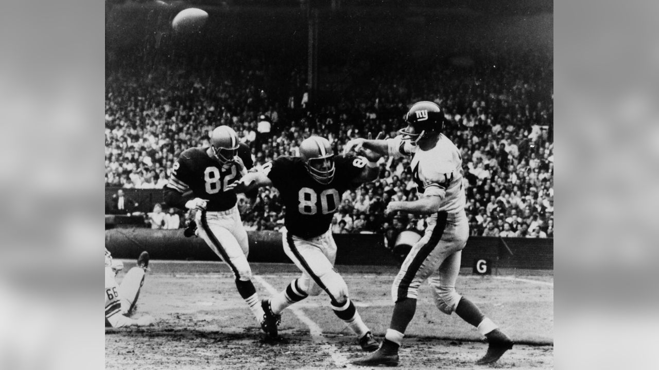 Y.A. Tittle, New York giant's quarter back, leaves the field with an  injured knee at palmer stadium in Princeton, N.C., August 29, 1964.Tittle  suffered the injury early in the second period of