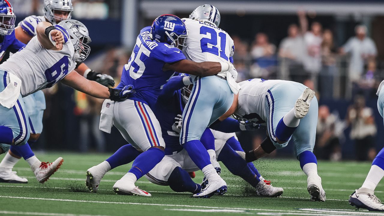 New York Giants linebacker Lorenzo Carter (59) celebrates intercepting a  Dallas Cowboys' Dak Prescott pass in the first half of an NFL football game  in Arlington, Texas, Sunday, Oct. 10, 2021. (AP