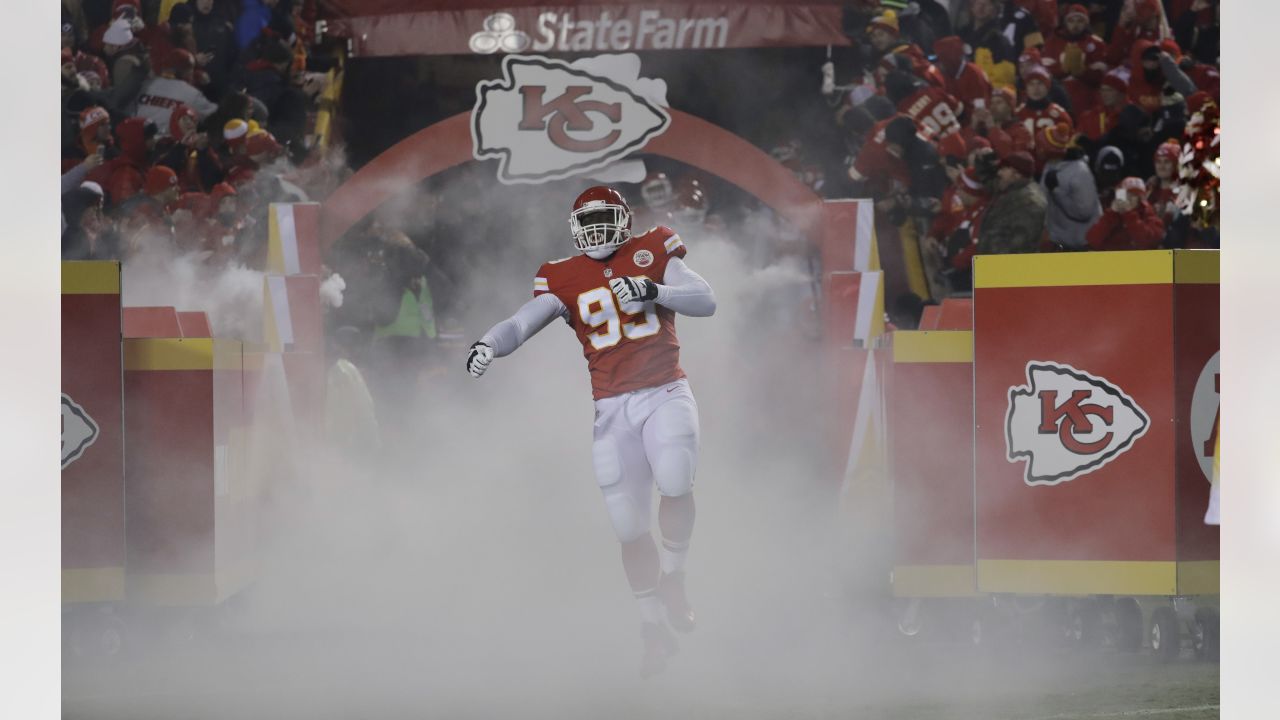 Tampa Bay Buccaneers defensive tackle Rakeem Nunez-Roches (56) with a smart  phone celebrating after an NFL football game against the Seattle Seahawks  on Nov. 13, 2022, in Munich. The Buccaneers defeated the