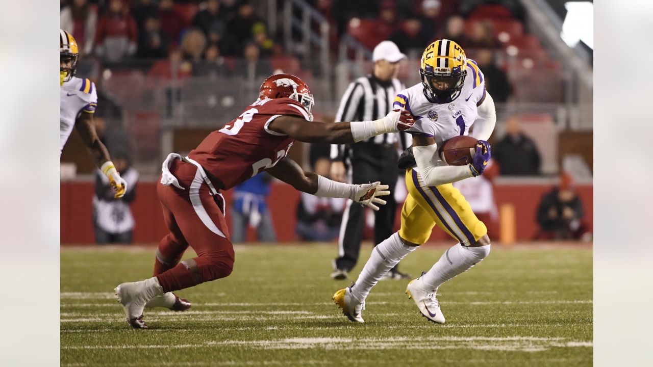 LSU wide receiver Ja'Marr Chase (1) celebrates after scoring with