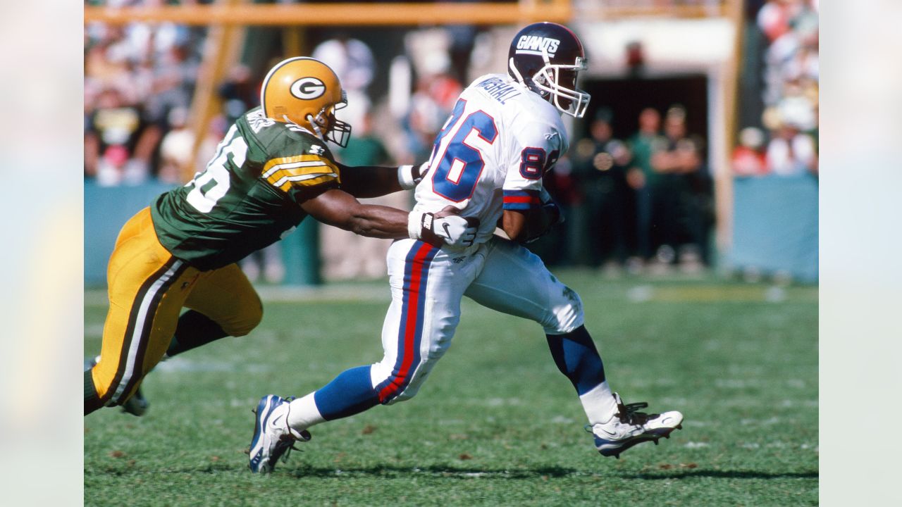 Green Bay Packers Charlie Peprah tries to tackle New York Giants