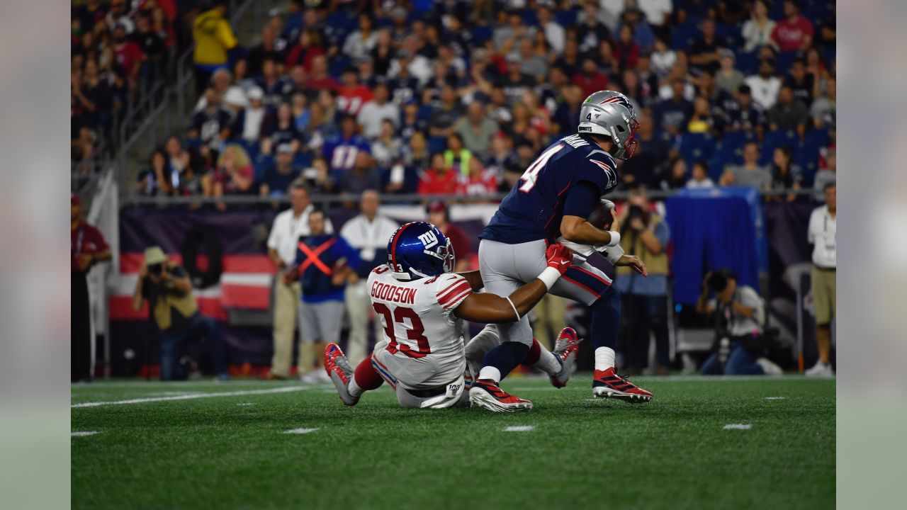 New York Giants cornerback Julian Love (37) tackles New England Patriots  wide receiver Julian Edelman in the first half of an NFL preseason football  game, Thursday, Aug. 29, 2019, in Foxborough, Mass. (