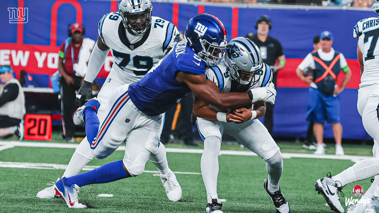 Carolina Panthers' D.J. Moore (12) fumbles the ball after being hit by New  Orleans Saints' Vonn Bell (24) in the second half of an NFL football game  in Charlotte, N.C., Monday, Dec.