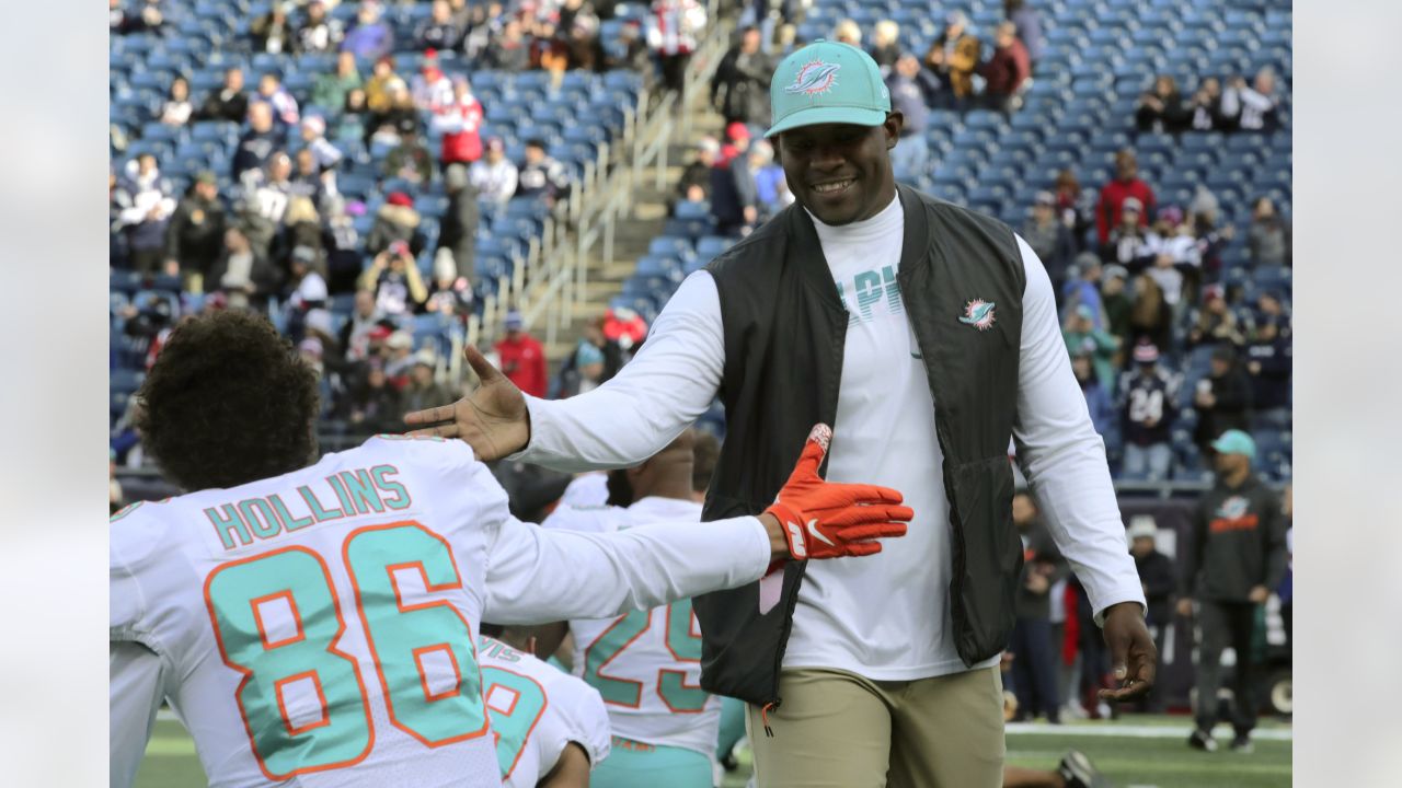 Miami Dolphins guard Michael Deiter (63) heads onto the field for warmups  before the start of a NFL preseason football game against the Las Vegas  Raiders, Saturday, Aug. 20, 2022, in Miami