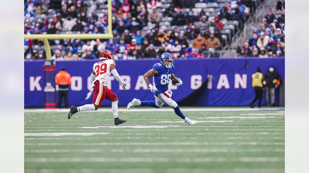 New York Giants fullback Elijhaa Penny (39) and defensive back Steven  Parker (38) react after a defensive play against the Washington Football  Team during the first quarter of an NFL football game, Sunday, Jan. 9,  2022, in East Rutherford, N.J. (AP Pho