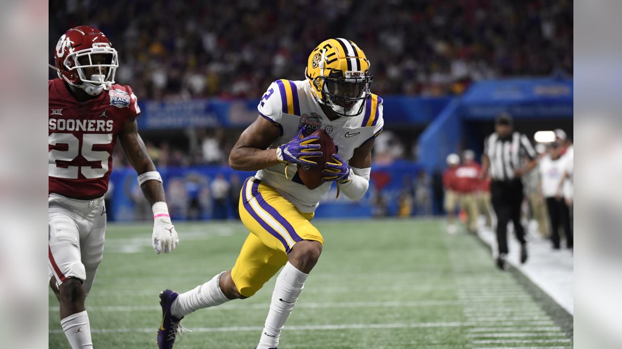 LSU wide receiver Justin Jefferson (2) celebrates his touchdown against  Oklahoma during the fir …