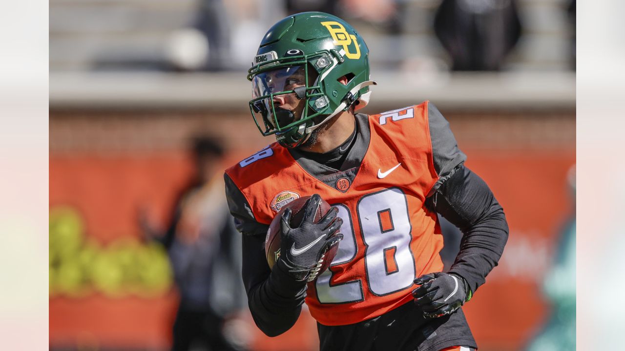 National Team offensive lineman Matt Waletzko of North Dakota and offensive  lineman Bernhard Raimann of Central Michigan run through drills during  practice for the Reese's Senior Bowl Tuesday, Feb. 2, 2022, in