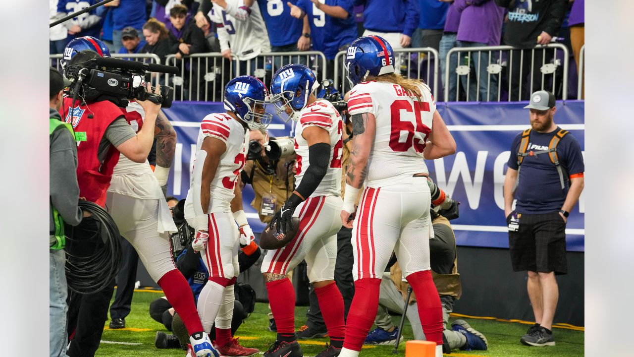 Minnesota Vikings running back Dalvin Cook walks on the field before an NFL  wild card playoff football game against the New York Giants, Sunday, Jan.  15, 2023, in Minneapolis. (AP Photo/Charlie Neibergall