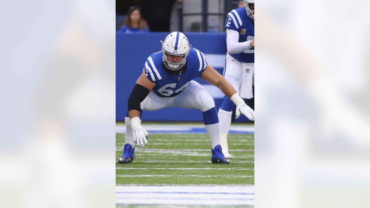 Indianapolis Colts guard Mark Glowinski (64) walks back to the