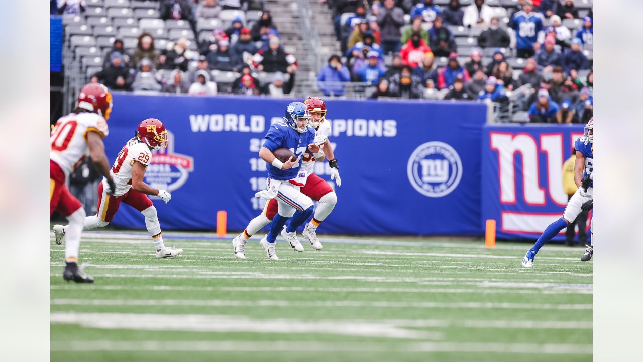 New York Giants fullback Elijhaa Penny (39) and defensive back Steven  Parker (38) react after a defensive play against the Washington Football  Team during the first quarter of an NFL football game, Sunday, Jan. 9,  2022, in East Rutherford, N.J. (AP Pho