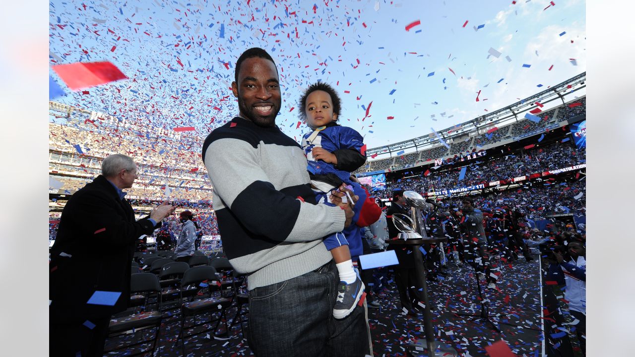 New York Giants defensive tackle Barry Cofield holds up a newspaper  proclaiming the Giants' win over the New England Patriots at Super Bowl  XLII at University of Phoenix Stadium in Glendale, Arizona