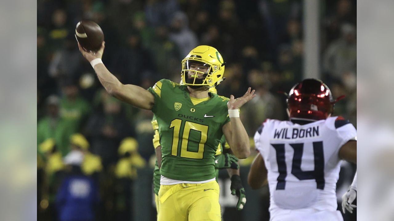 Justin Herbert Oregon Ducks Unsigned All White Throwing Photograph