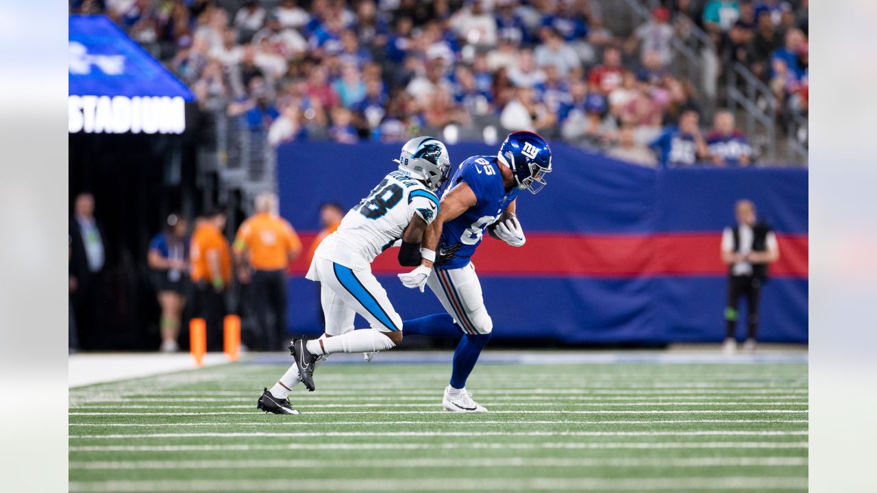 Carolina Panthers cornerback Captain Munnerlyn (41) returns an interception  during first half NFL action between the New York Giants and the Carolina  Panthers at New Meadowlands Stadium in East Rutherford, New Jersey.