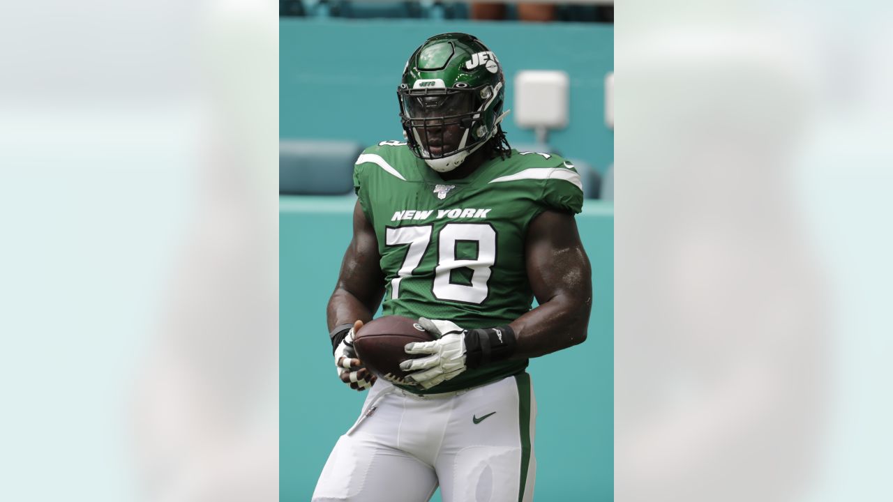 New York Giants offensive lineman Jonotthan Harrison takes the field to  face the Atlanta Falcons before an NFL football game, Sunday, Sept. 26, 2021,  in East Rutherford, N.J. (AP Photo/Adam Hunger Stock