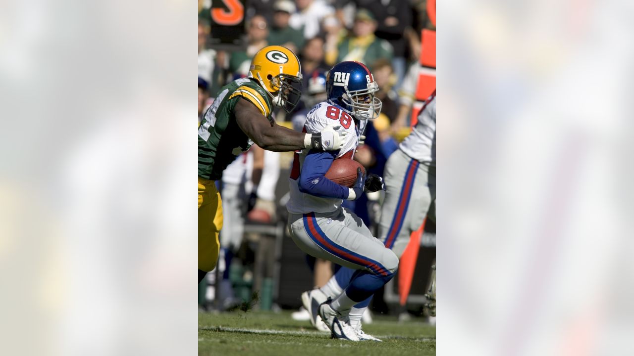 Gree Bay Packers wide receiver Greg Jennings (85) celebrates with teammate  Donald Driver after catching a first-quarter touchdown pass against the  Tampa Bay Buccaneers during an NFL football game, Sunday, Sept. 28