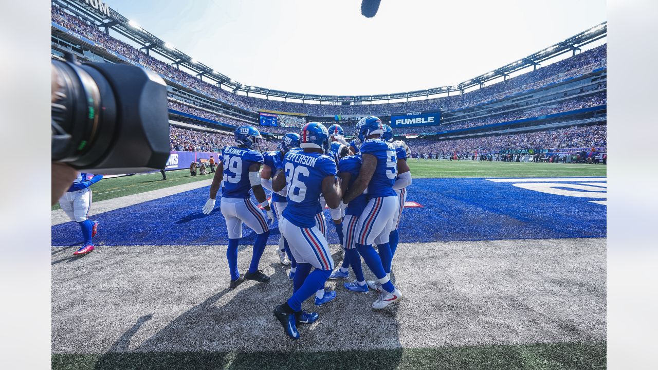 Carolina Panthers' Jeremy Chinn, left, tries unsuccessfully to stop New  York Giants' Daniel Bellinger from scoring a touchdown during the second  half an NFL football game, Sunday, Sept. 18, 2022, in East