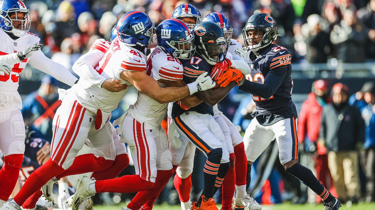 New York Giants inside linebacker Reggie Ragland (55) runs on the field  during the first half of an NFL football game against the Chicago Bears,  Sunday, Jan. 2, 2022, in Chicago. (AP