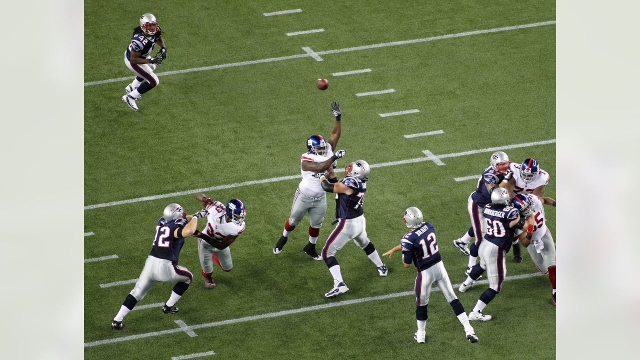 29 December 2007: New England Patriots Tom Brady #12 leaves the field after  the game against the New York Giants at Giants Stadium in East Rutherford,  NJ. The Patriots beat the Giants