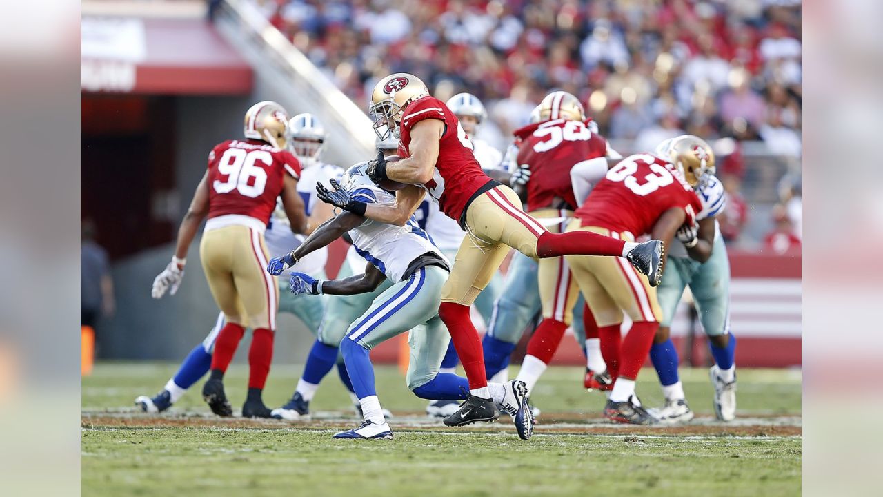 Greg Jennings of the Green Bay Packers tackles Craig Dahl of the St.  News Photo - Getty Images