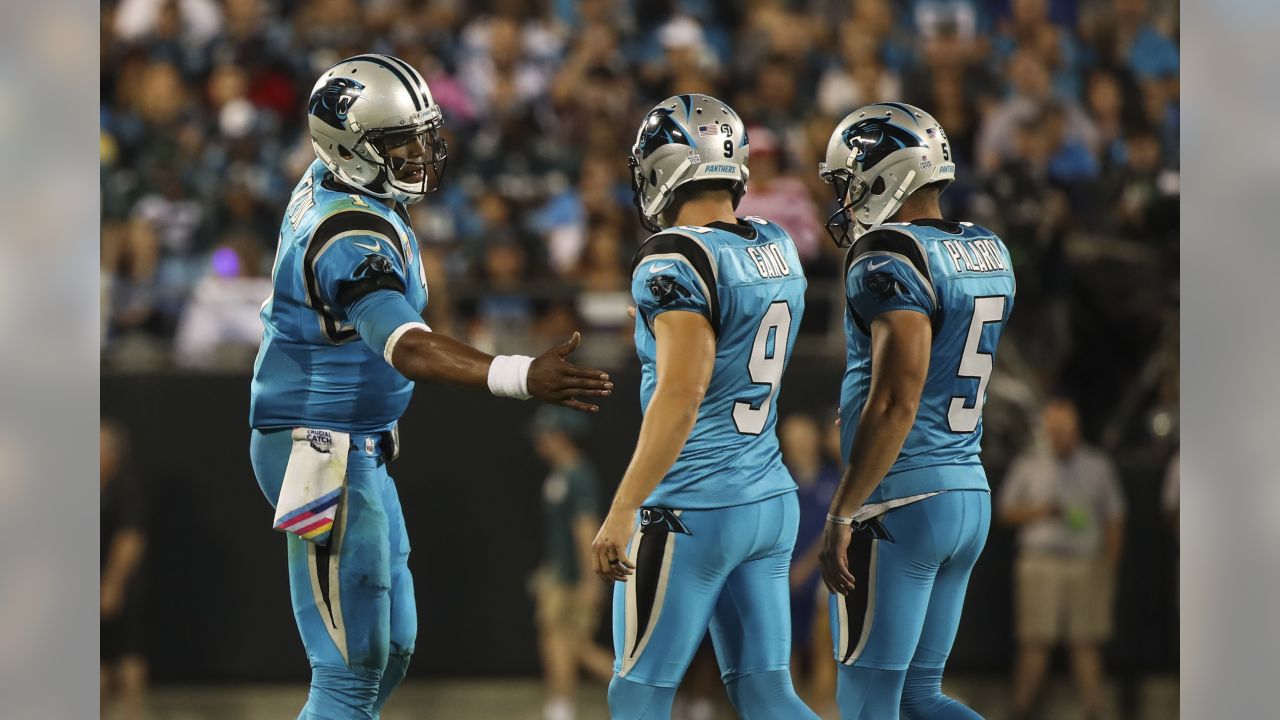 Carolina Panthers quarterback Cam Newton (1) leads the huddle in the rain  during the NFL football game between the Indianapolis Colts and the Carolina  Panthers on Monday, Nov. 2, 2015 in Charlotte