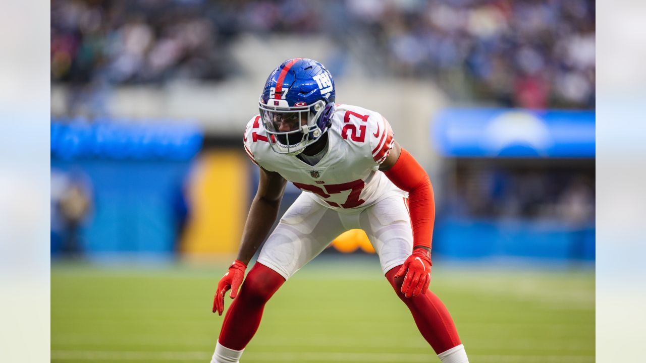 New York Giants fullback Elijhaa Penny (39) and defensive back Steven  Parker (38) react after a defensive play against the Washington Football  Team during the first quarter of an NFL football game, Sunday, Jan. 9,  2022, in East Rutherford, N.J. (AP Pho