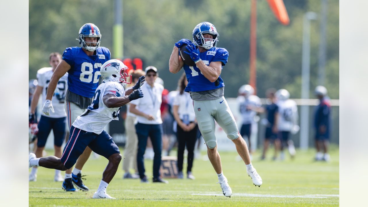 Giants' Saquon Barkley participates in live drills during practice vs.  Patriots