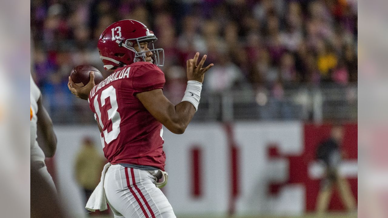 Tua looking like “Alabama Tua” with that red practice jersey 