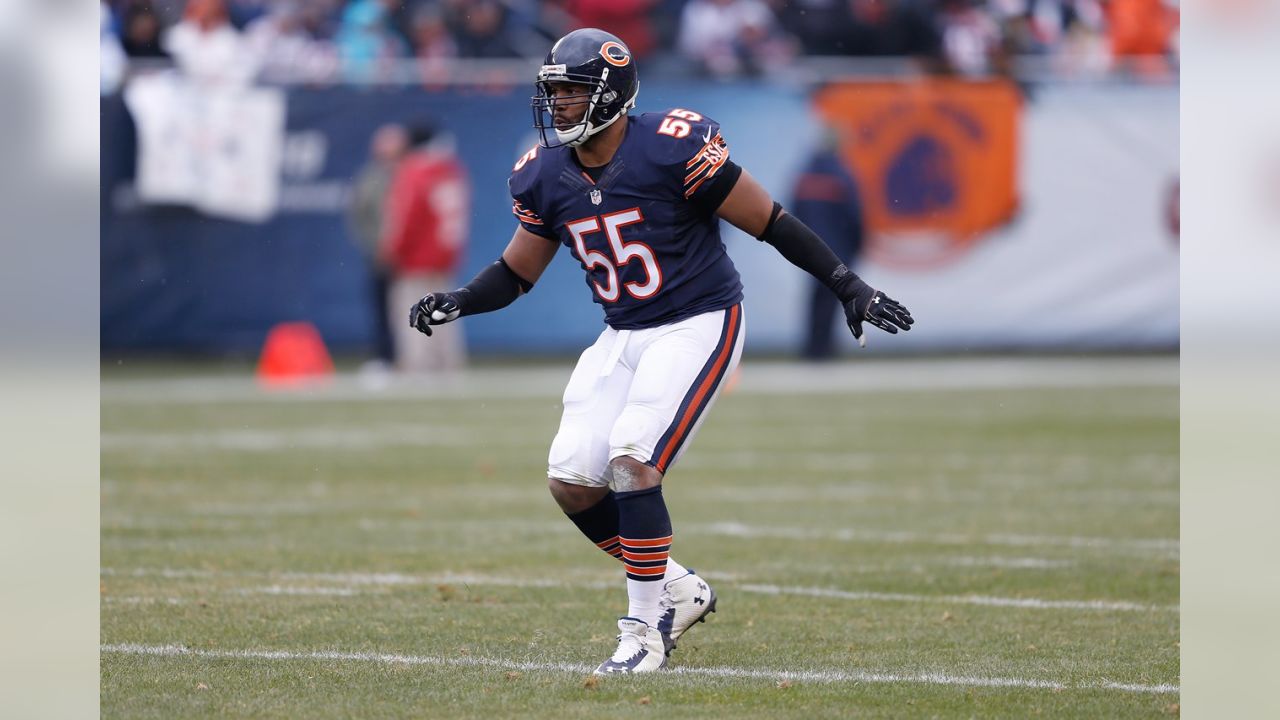 Oakland Raiders Michael Bush (29) goes helmet to helmet with Chicago Bears  Lance Briggs (55) at