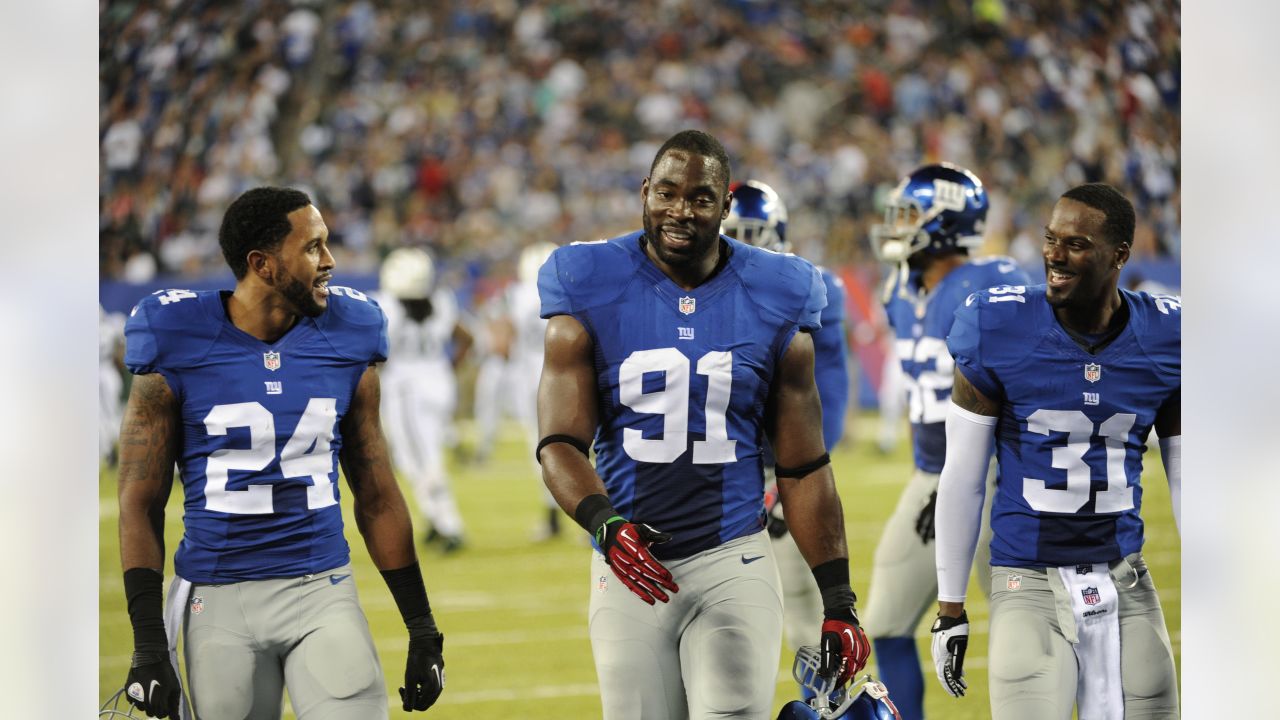 September 15, 2013: New York Giants defensive end Justin Tuck (91) during  the first half of a week 2 NFL matchup between the Denver Broncos and the  Ne Stock Photo - Alamy