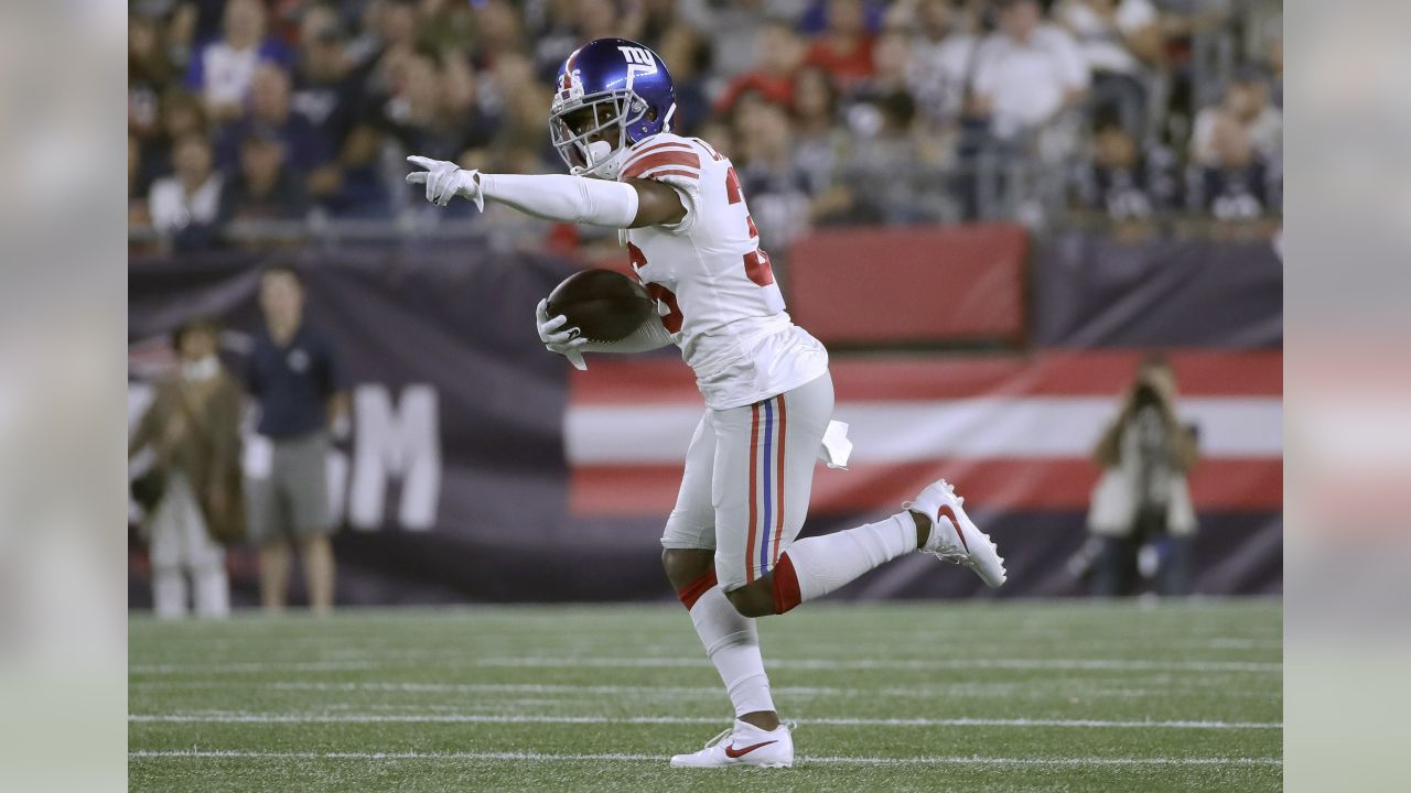 New York Giants cornerback Julian Love (37) tackles New England Patriots  wide receiver Julian Edelman in the first half of an NFL preseason football  game, Thursday, Aug. 29, 2019, in Foxborough, Mass. (