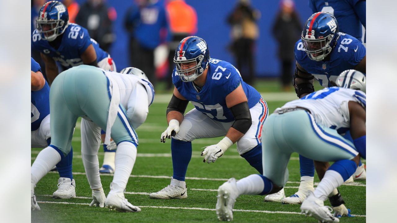 New York Giants fullback Elijhaa Penny (39) and defensive back Steven  Parker (38) react after a defensive play against the Washington Football  Team during the first quarter of an NFL football game, Sunday, Jan. 9,  2022, in East Rutherford, N.J. (AP Pho